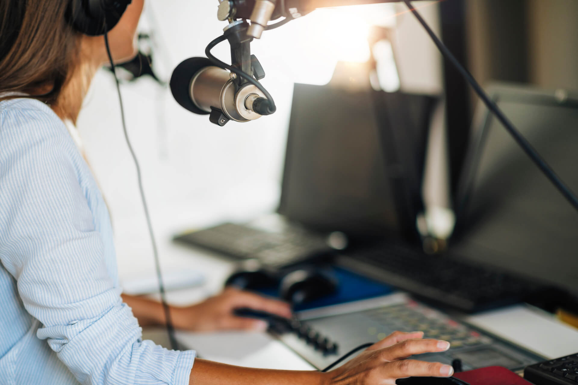 podcast-concept-female-host-in-podcasting-studio-2021-08-29-09-26-20-utc.jpg